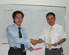 2006年8月21日に行われた提携調印式（中国上海市にて）